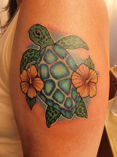 Explore strawberry tattoo ideas, creative tattoo ideas in Kailua Kona, available at Lady Luck Tattoo & Body Piercing