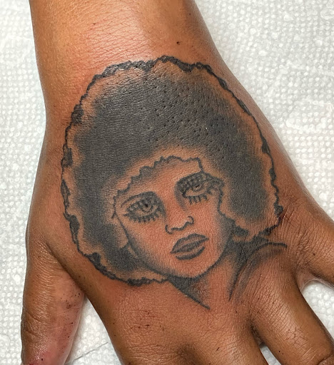 Explore female hand tattoo ideas, creative tattoo ideas in Providence, available at Hope Street Tattoo
