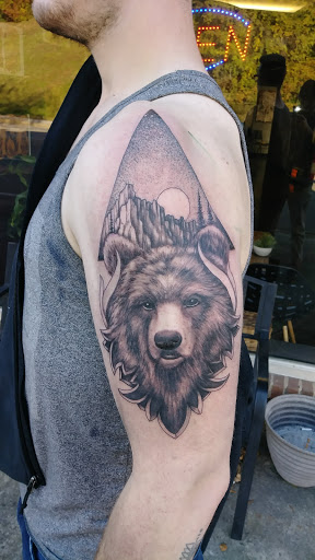 Explore small alien tattoo ideas, creative tattoo ideas in Chattanooga, available at Standard Ink Tattoo Co