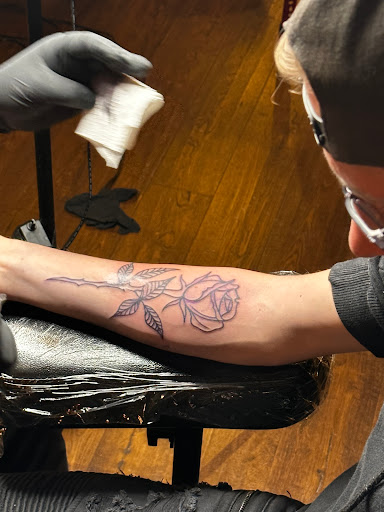 Explore side neck tattoo ideas, creative tattoo ideas in Johnson City, available at Gold Cross Tattoo Co.