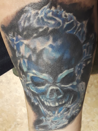 Explore face tattoo ideas black male, creative tattoo ideas in Springfield, available at Dark Ship Tattoo inc