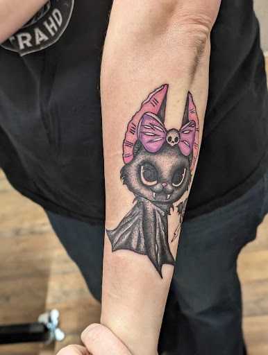 Explore lower stomach tattoo ideas, creative tattoo ideas in Cornelia, available at Prismatic Pulse Tattoo