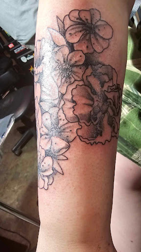 Explore 1991 tattoo ideas, creative tattoo ideas in Bloomington, available at Til Death Tattoo And Piercing Parlor