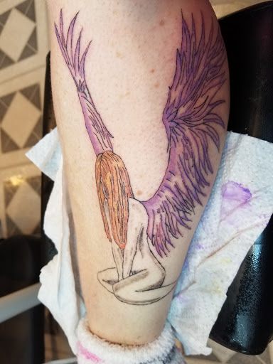 Explore men's neck tattoo ideas, creative tattoo ideas in Davis, available at SIX GUN SOUND TATTOO