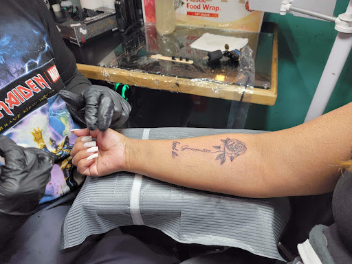 Explore american flag tattoo ideas for guys, creative tattoo ideas in San Diego, available at Sideshow Tattoo and Piercing