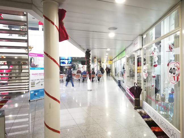 Avaliações doCentro Comercial Triângulo em Guimarães - Shopping Center