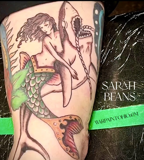 Explore swiss tattoo ideas, creative tattoo ideas in Painesville, available at War Paint Studios - Canvas and Skin