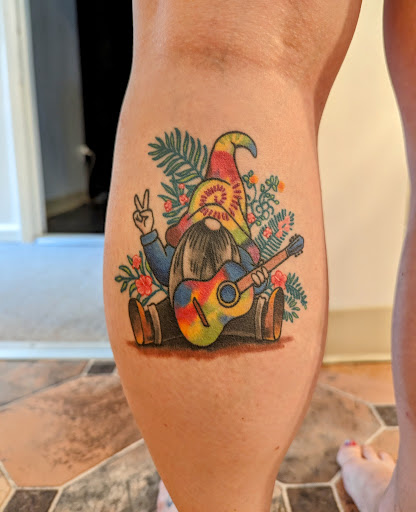 Explore shark tooth tattoo ideas, creative tattoo ideas in Hebron, available at Explosive Ink Tattoo