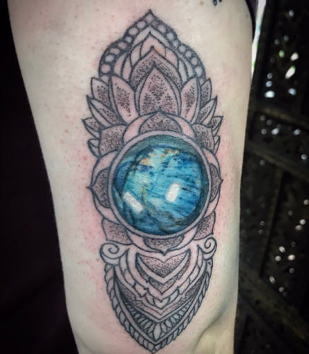 Find crown tattoo ideas for females for your next unique tattoo in Tecumseh at Lucid Tattoo Gallery