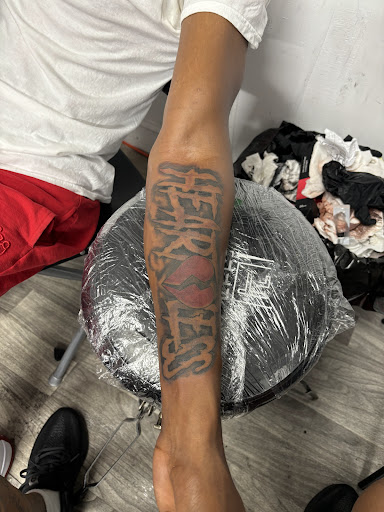 Explore song lyrics for tattoos ideas, creative tattoo ideas in Mattapan, available at Famous Touch Tattoos