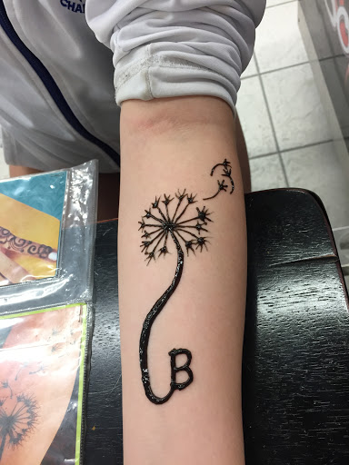 Explore tan tattoo ideas, creative tattoo ideas in South Padre Island, available at Peggys Temporary & Permanent Tattoos