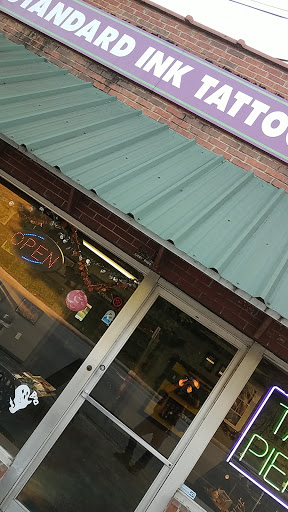 Explore lion family tattoo ideas, creative tattoo ideas in Chattanooga, available at Standard Ink Tattoo Co