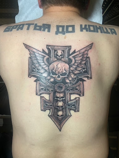 Find back tattoo ideas women for your next unique tattoo in Renton at Rum Thai Tattoo