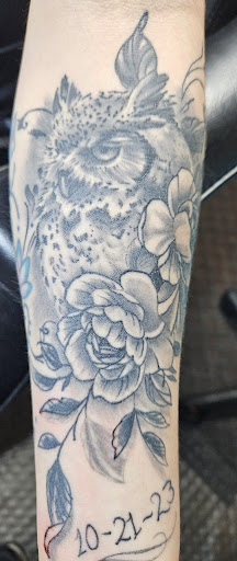 Explore daddy and son tattoo ideas, creative tattoo ideas in Angola, available at Hoodlum Ink