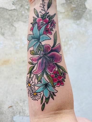 Explore tattoo for mom and dad ideas, creative tattoo ideas in Williamston, available at Lucky Tiger Tattoo studio