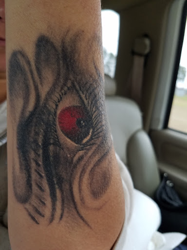 Explore cute girl tattoo ideas, creative tattoo ideas in Wilson, available at New Addiction Tattoos