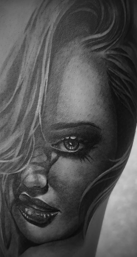 Explore watercolor flower tattoo ideas, creative tattoo ideas in Dallas, available at Empire barbers & Ink