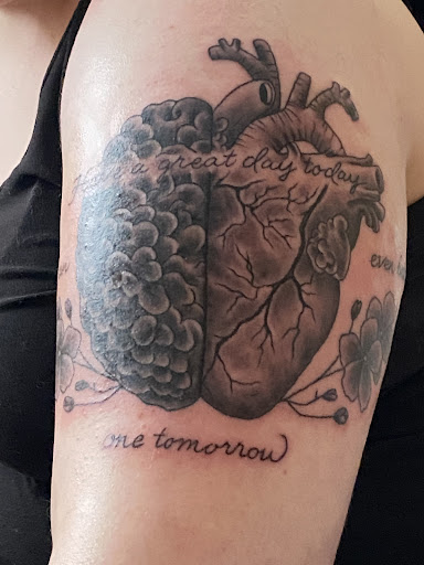 Find tattoo ideas for stepson for your next unique tattoo in Bainbridge at Olde Town Ink