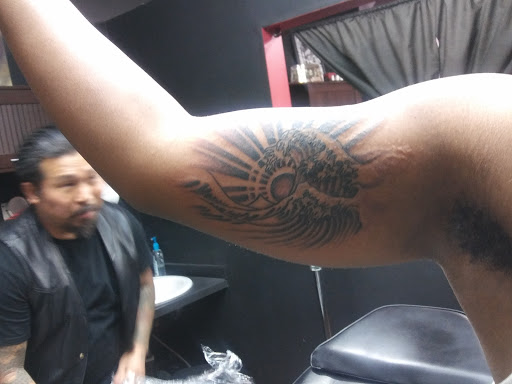 Explore face tattoo ideas black male, creative tattoo ideas in Saint Paul, available at Hungs Tattoo Parlor
