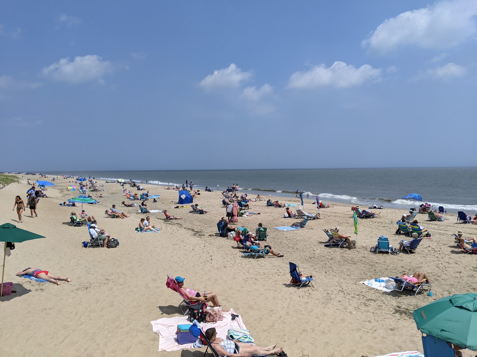 Fotografija Cape Henlopen Beach z svetel pesek površino