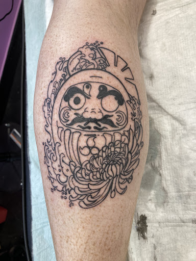 Explore neck tattoo men ideas, creative tattoo ideas in Barberton, available at Magic City Tattoo Company