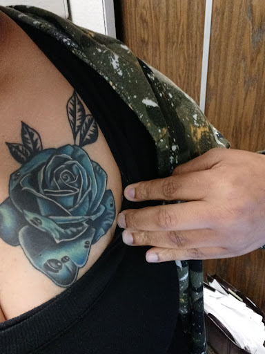 Explore cover up tattoo ideas on shoulder, creative tattoo ideas in Pineville, available at Roldans Tattoo Studio