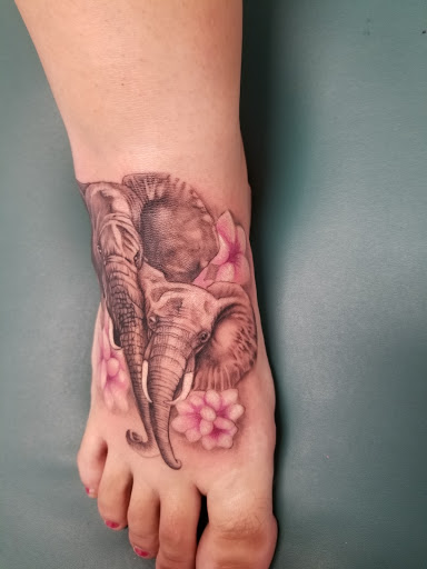 Explore forearm christian tattoo ideas, creative tattoo ideas in Kissimmee, available at Precision Ink Tattoo Company