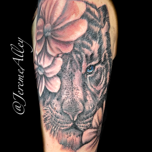 Explore skier tattoo ideas, creative tattoo ideas in Belmont, available at Phoenix Tattoo