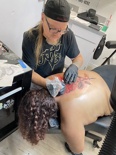 Explore lighter tattoo ideas, creative tattoo ideas in Toledo, available at Artistik Tat2 and Body Piercing