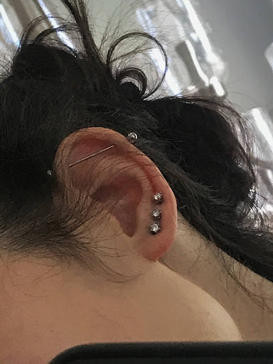 Explore cool halloween tattoo ideas, creative tattoo ideas in Mckinney, available at The Magic Needle Piercing Studio