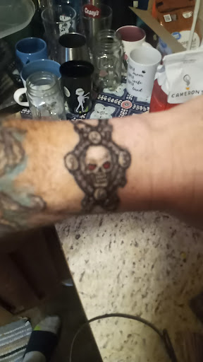 Explore dragon tattoo ideas for guys, creative tattoo ideas in Salina, available at True Love Tattoo