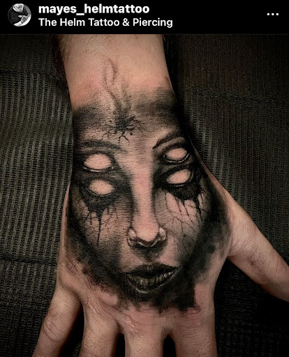 Explore rainbow tattoo ideas, creative tattoo ideas in Fort Oglethorpe, available at The Helm Tattoo & Piercing