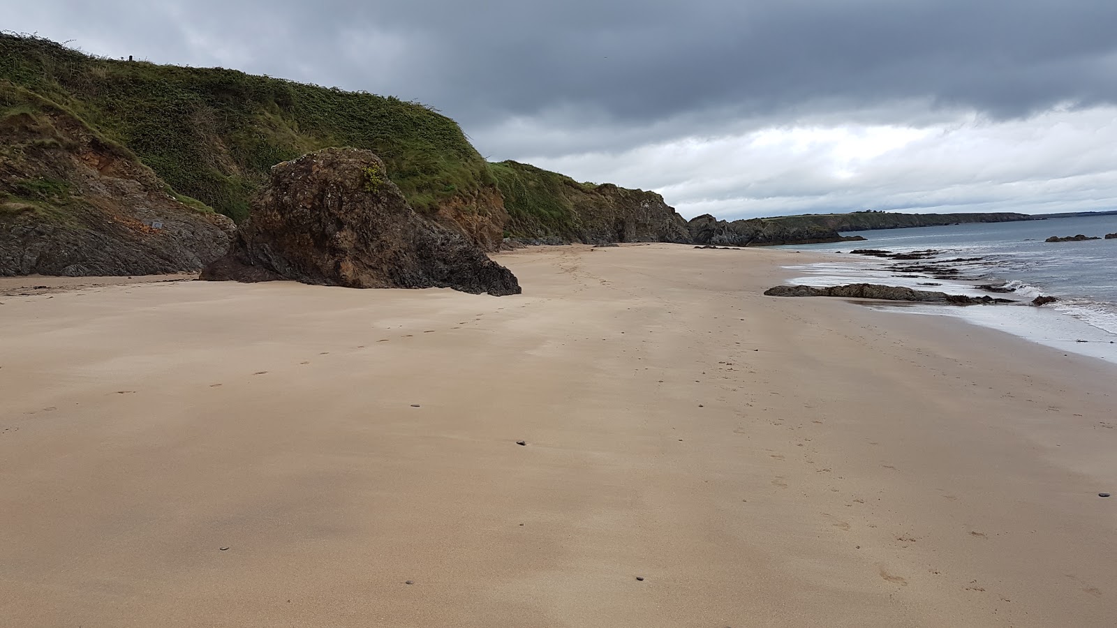 Photo of Baginbun Beach and the settlement