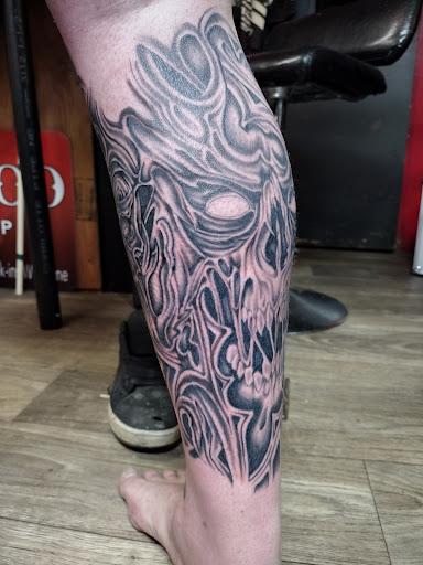 Explore mens behind the ear tattoo ideas, creative tattoo ideas in Shippensburg, available at LAZY WIZARD TATTOOS