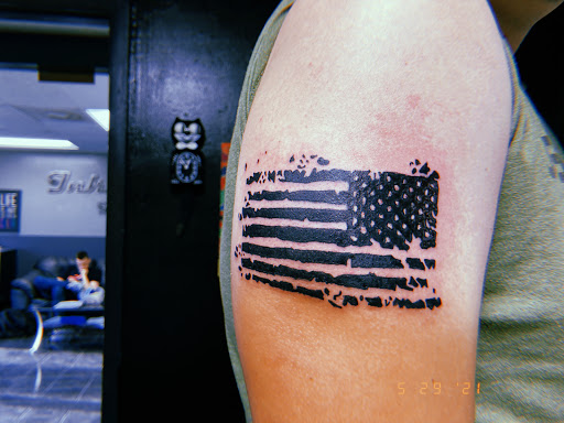 Explore blackout hand tattoo ideas, creative tattoo ideas in Jacksonville, available at Inkstainz tattoo studio