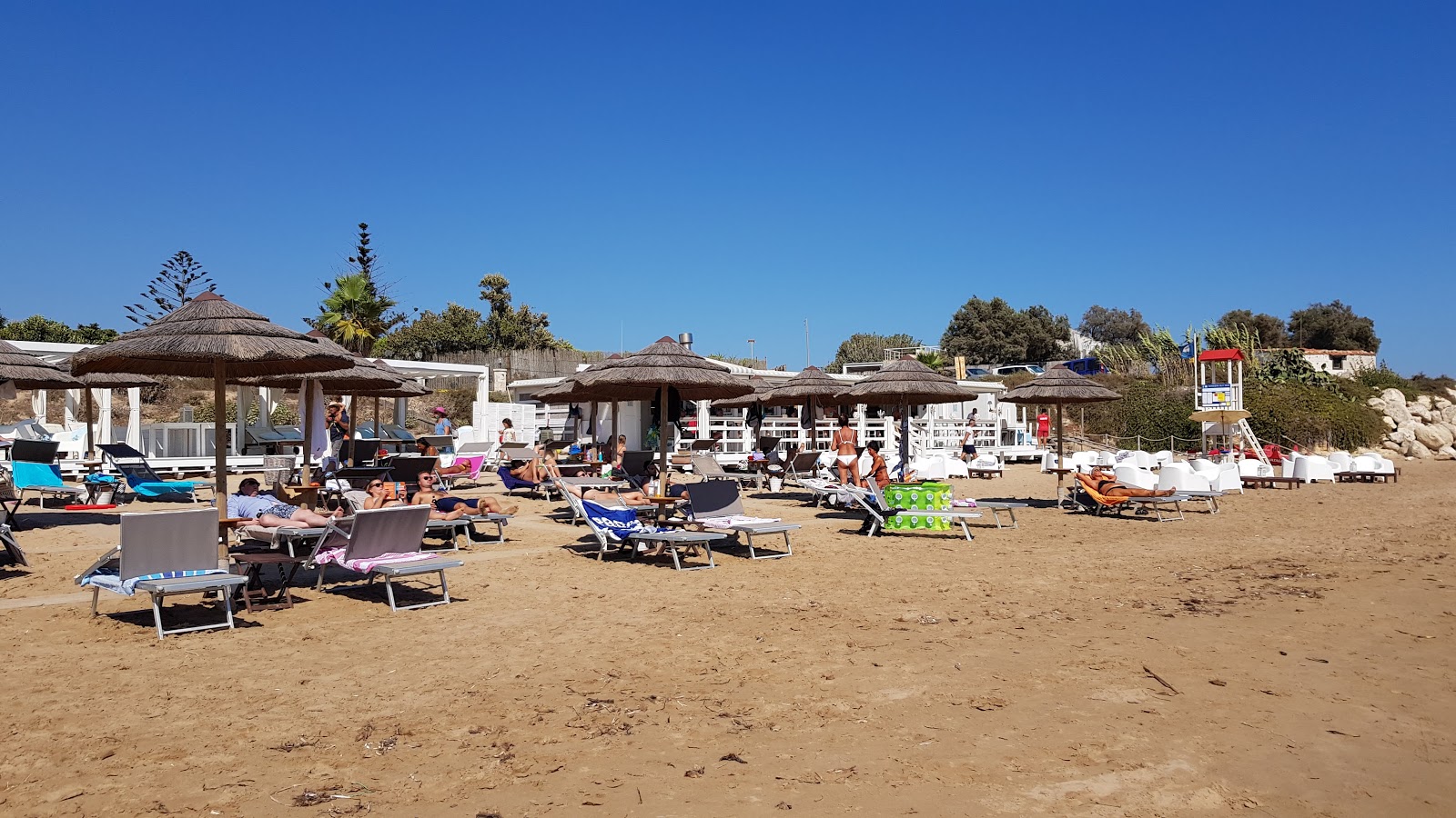 Porto Ulisse beach的照片 带有碧绿色纯水表面