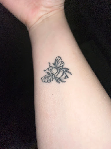 Explore red ink neck tattoo ideas, creative tattoo ideas in Old Orchard Beach, available at Mad Hatters Tattoo Studio