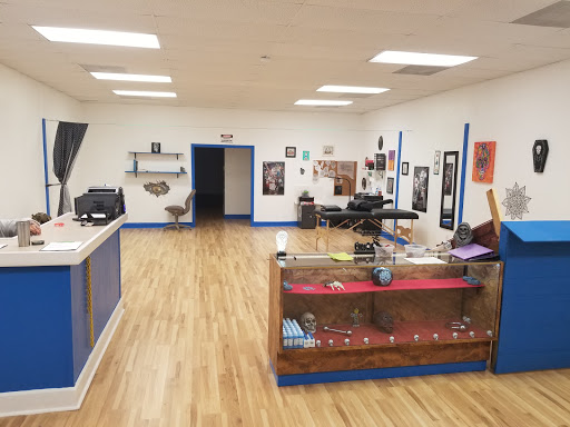 Explore tricep tattoo ideas for guys, creative tattoo ideas in Ocean Springs, available at Heart & Daggers Tattoo Studio LLC