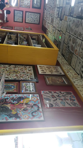 Explore small frog tattoo ideas, creative tattoo ideas in Morrow, available at The Inkers Parlour