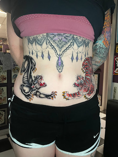 Find background tattoo ideas for guys for your next unique tattoo in Georgetown at Iron Rite Tattoo South