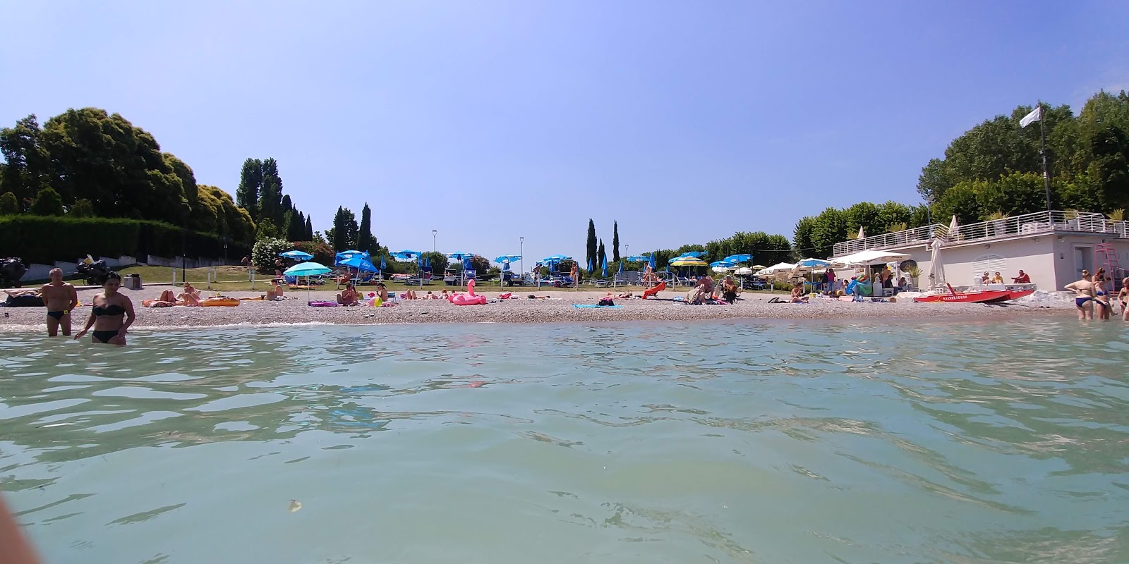 Foto von Spiaggia Cala de Or - beliebter Ort unter Entspannungskennern