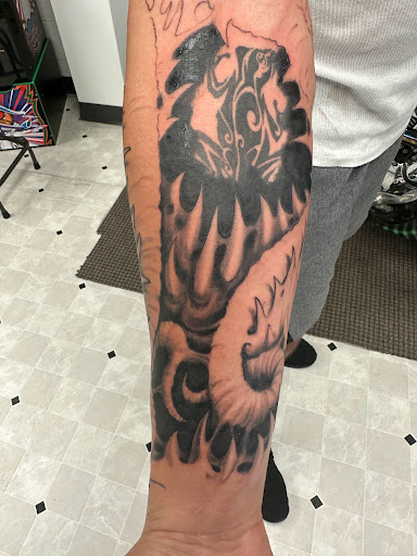 Explore magnolia tattoo ideas, creative tattoo ideas in Orland, available at K1LL3R ARTW0RK