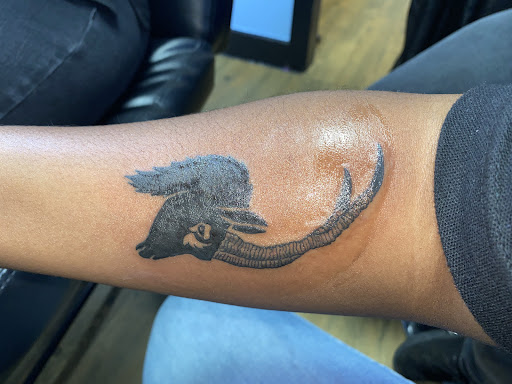 Explore guns n roses tattoo ideas, creative tattoo ideas in Montgomery, available at Black Dragon Tattoo & Gallery