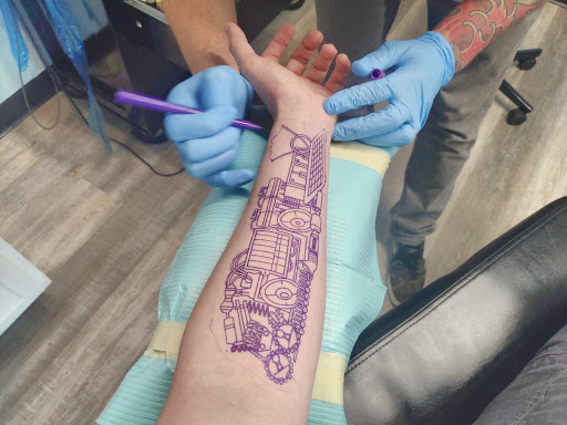 Explore half sleeve memorial tattoo ideas, creative tattoo ideas in Bismarck, available at Alchemist Tattoo & Body Piercing