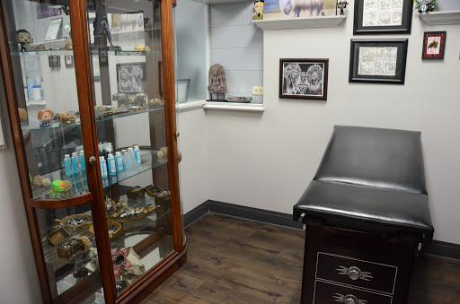 Explore autism puzzle piece tattoo ideas, creative tattoo ideas in Bradley, available at Oak and Ember Tattoo