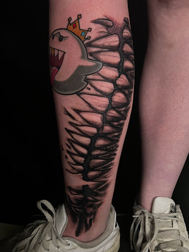 Explore tattoo ideas leg calf, creative tattoo ideas in Albuquerque, available at Blacklist Tattoo Parlour Tattoo Shop in Albuquerque