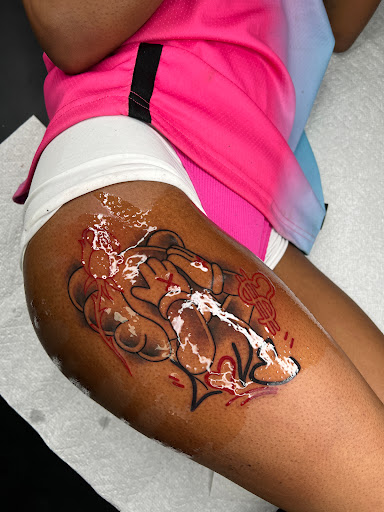 Explore dinosaur tattoo ideas for son, creative tattoo ideas in Las Vegas, available at Black Plague Tattoos