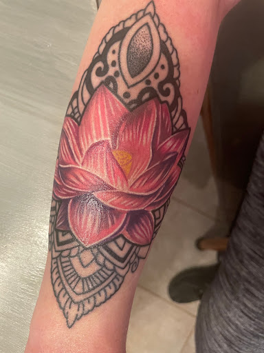 Explore tattoo ideas for women in arm, creative tattoo ideas in Duluth, available at Tattoo Fiesta