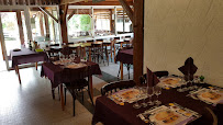 Atmosphère du Restaurant français Restaurant Le Feu de Bois à Orléat - n°1