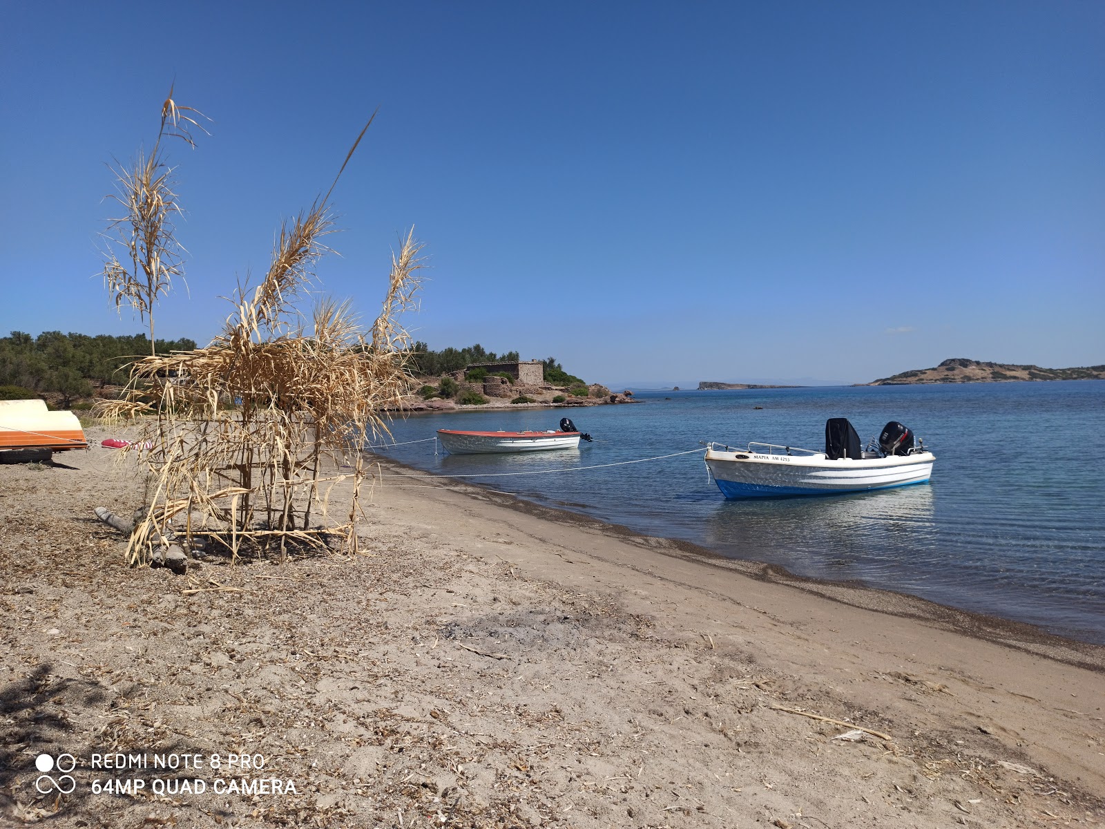 Foto von Paralia Tokmakia II mit türkisfarbenes wasser Oberfläche